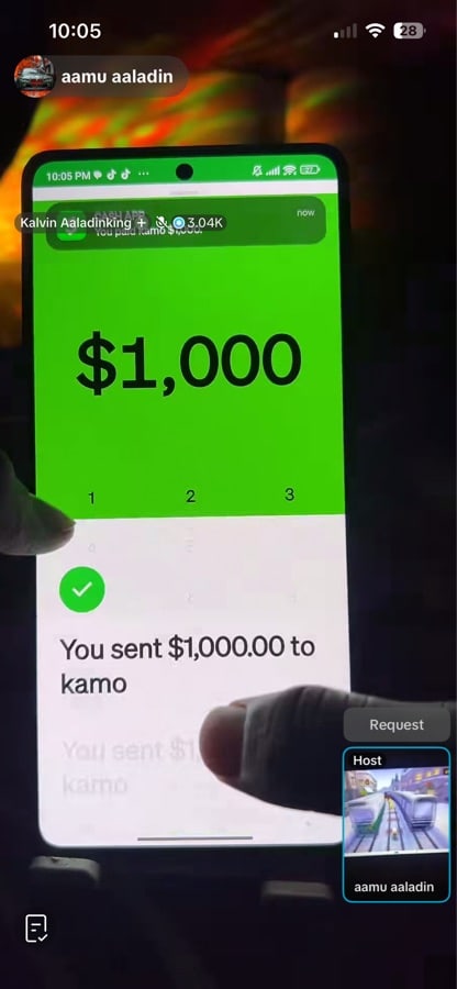 Phone showing green confirmation screen that says You sent $1,000.00 to kamo